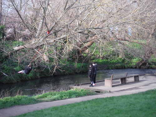 Kids playing in the River Ravensbourne in Ladywell Fields SWC Walk 421 - Blackheath to Deptford (Hills &amp; Parks of Inner Southeast London)