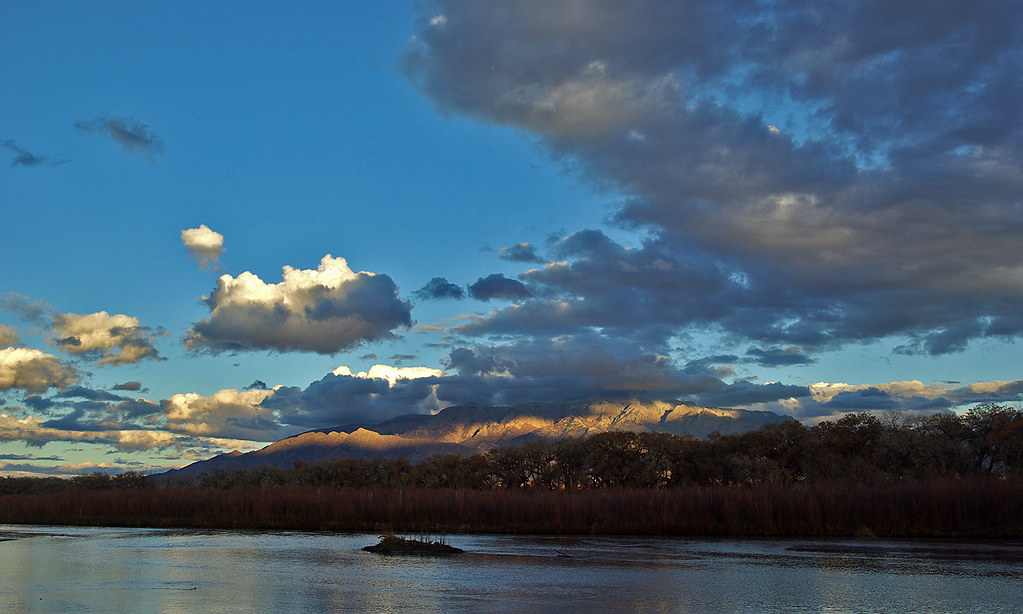 Rio Grande and Sandia Mountains at sunset. New Mexico, USA.