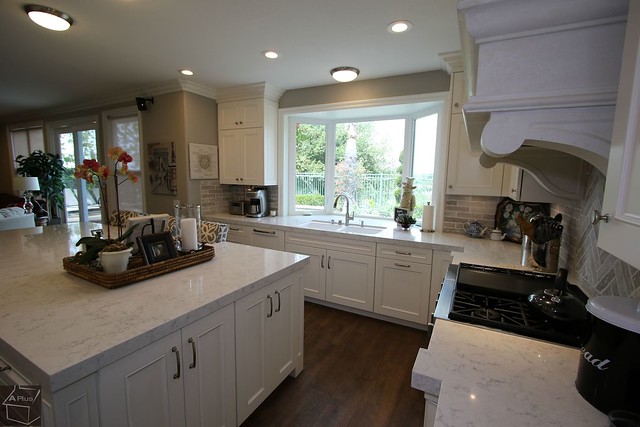 Classic, Transitional Design Build home Kitchen remodel with APlus white Cabinets wood floor in Dove Canyon, Orange County https://www.aplushomeimprovements.com/portfolio_page/dove-canyon-design-build-kitchen-remodel-with-custom-cabinets-orange-county124/