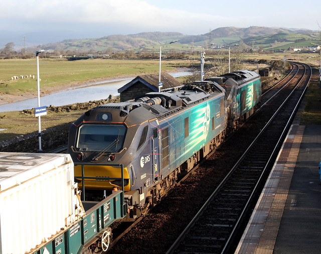 68 003 Astute and 88 002 Prometheus slow for the curve at Kirkby in Furness station on 6C53 Crewe-Sellafield flask train