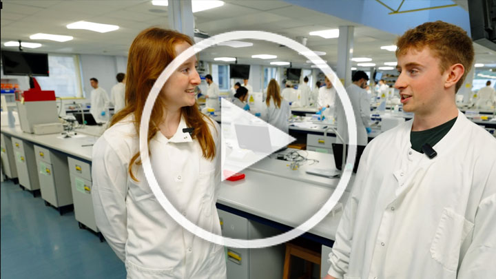 Biosciences lab with students standing in front