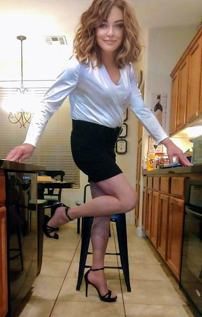 White Satin Blouse, Black Miniskirt, Stockings and High Heeled Ankle Strap Sandals