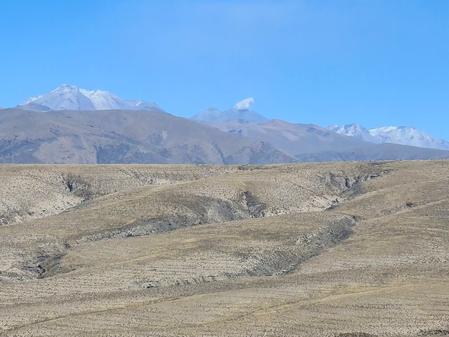 The Sabancaya volcano erupting gas along the Arequipa - Chivay road, Peru