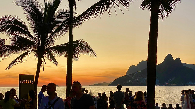 Crowd Watching Sunset Over Atlantic Ocean, Praia do Arpoador, Rio de Janeiro, Brazil