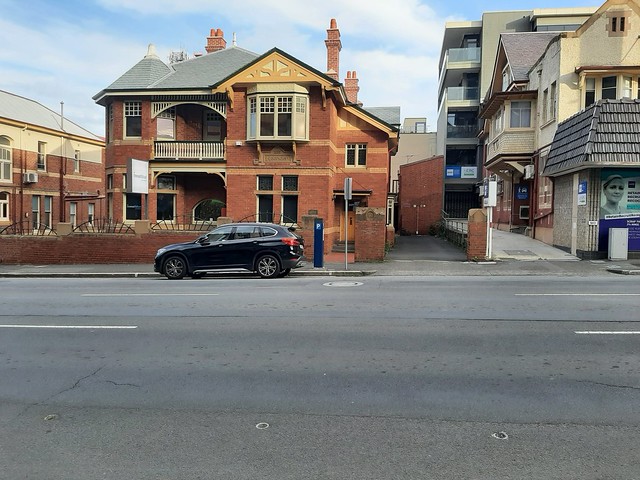 Hobart.  A  fine red brick Federation or Edwardian house in Macquarie Street.