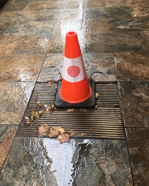 As it turned out, the grate has overflowed, a cone was installed, but never removed when the proble