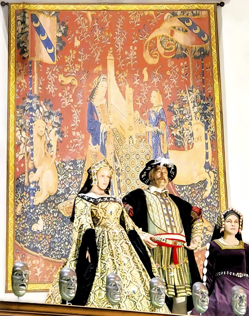 Henry VIII and his wives, together unlike in real life; reproduction of one of the tapestries from 
