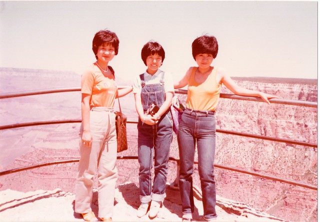 Young ladies from Japan visit the Grand Canyon in 1981.  Note the canyon itself in the background.