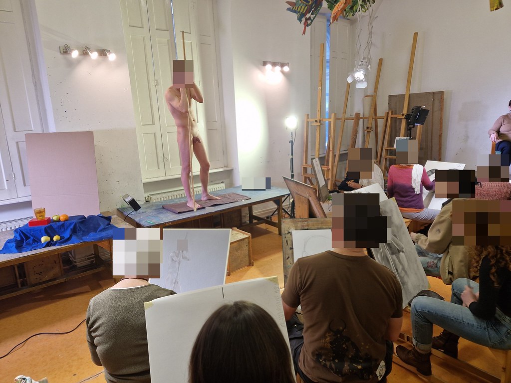 Posing nude for life drawing art class