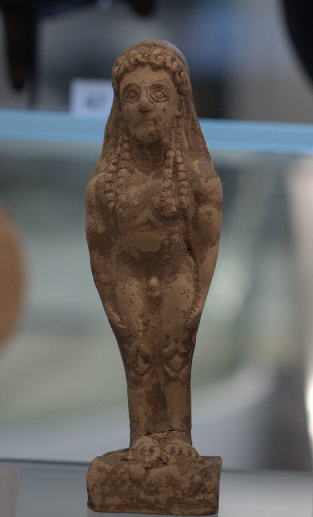 Tarentine terracotta figurine in the form of a kouros (standing nude youth)
