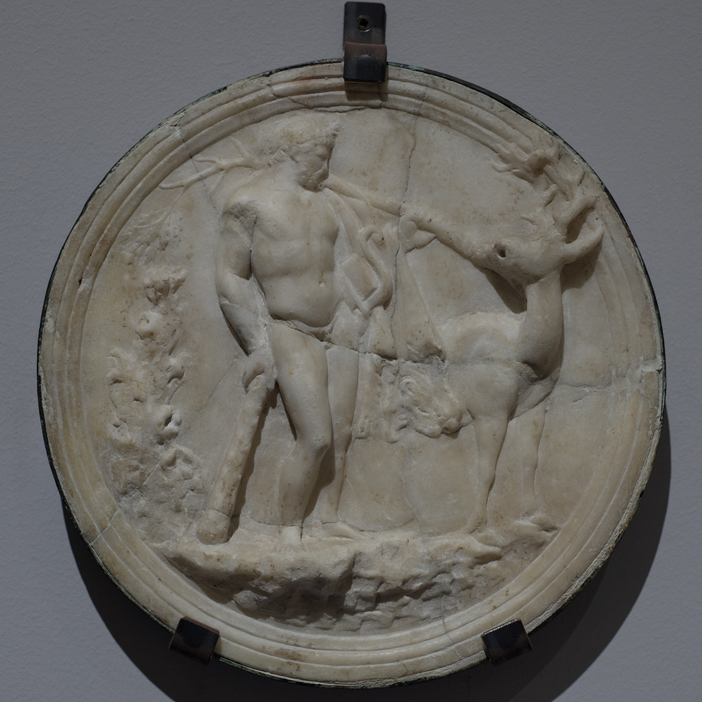 Roman marble oscillum with relief representing Hercules and the Cerynian Hind