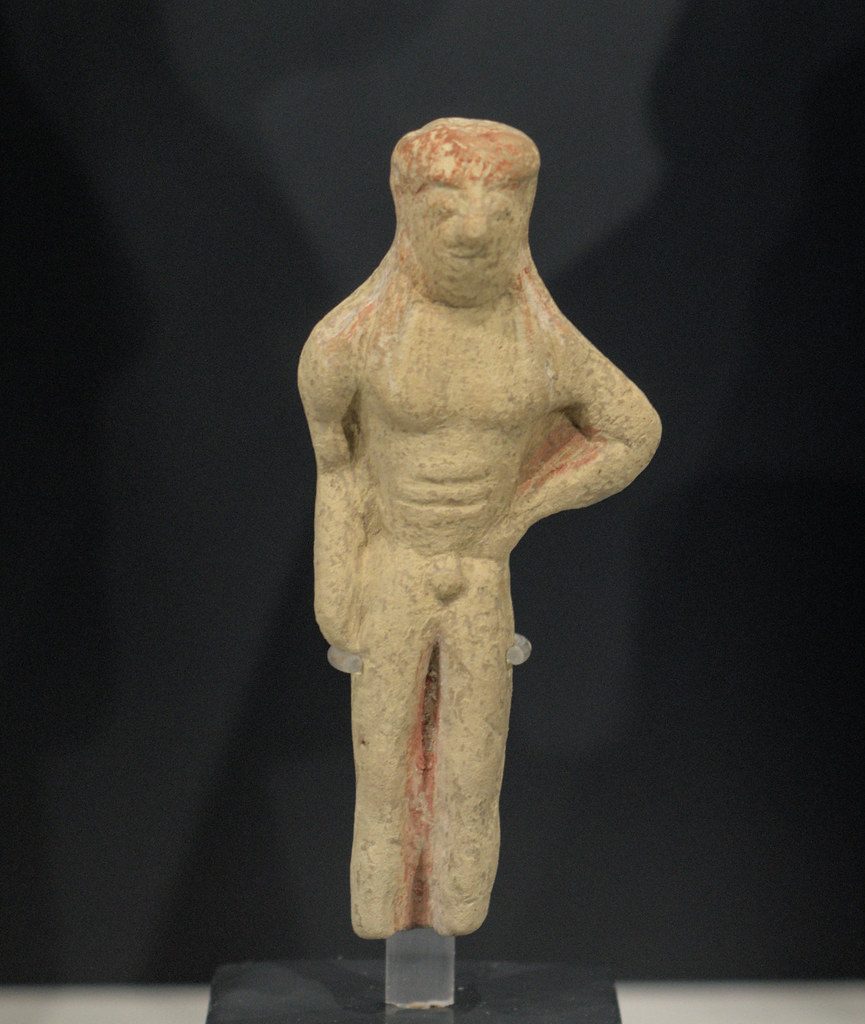 Terracotta figurine of a standing nude male figure from Taranto