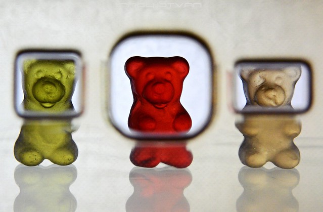 Three gummy bears through phone case