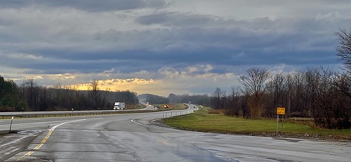 April 5, 2023: "Westbound Along the Good Old Thruway", LeRoy, New York Looking westward along the New York State Thruway from the exit of the Ontario Service Area in the town of LeRoy, New York on a cloudy spring evening.