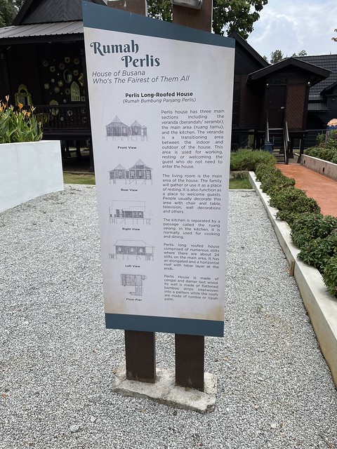 Signage about replica Perlis Long-Roofed Malay house you saw previously