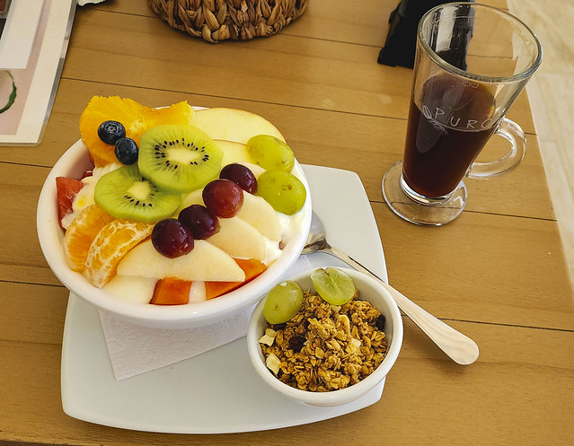 Fruit and yogurt bowl at Between 2 Buns restaurant in Kralendijk, Bonaire, Caribbean Netherlands - Feb. 2024.  Granola on the side.  That kept me going for most of the day.