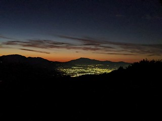 4233 The city lights of Riverside glowing below dawn's first color, with San Jacinto Peak above them