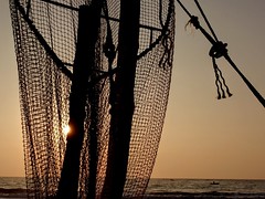 A Fishing Net Hangs from the Mast of a Sri Lankan Boat