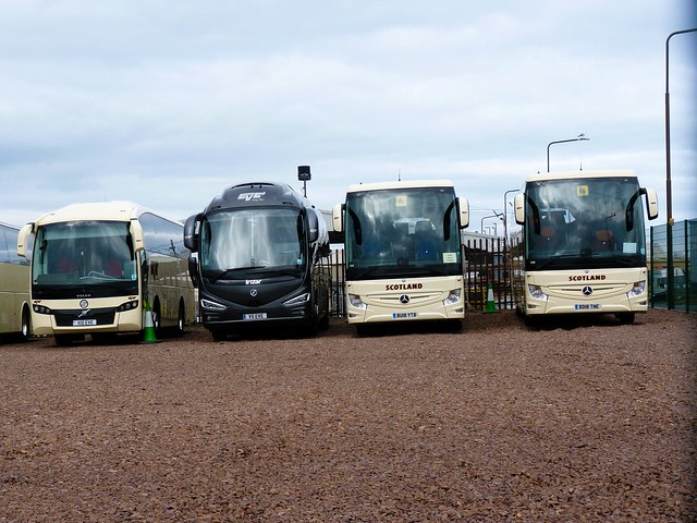 Eve Coaches of Dunbar Volvo B8R Sunsundegui SC5 K10EVE E42 and Irizar i6 Integral V5EVE E39, Mercedes Benz Tourismos 2 BU18YTB and BD18TNE at a recently completed compound at Spott Road, Dunbar, on 3 March 2024.