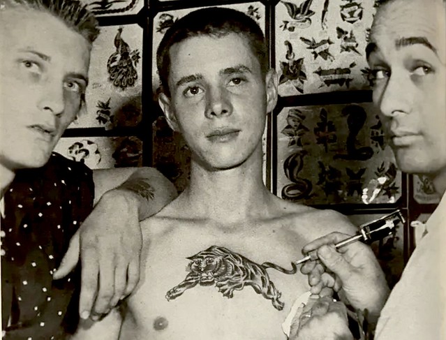 1950s Young Man Getting a Panther Chest Tattoo