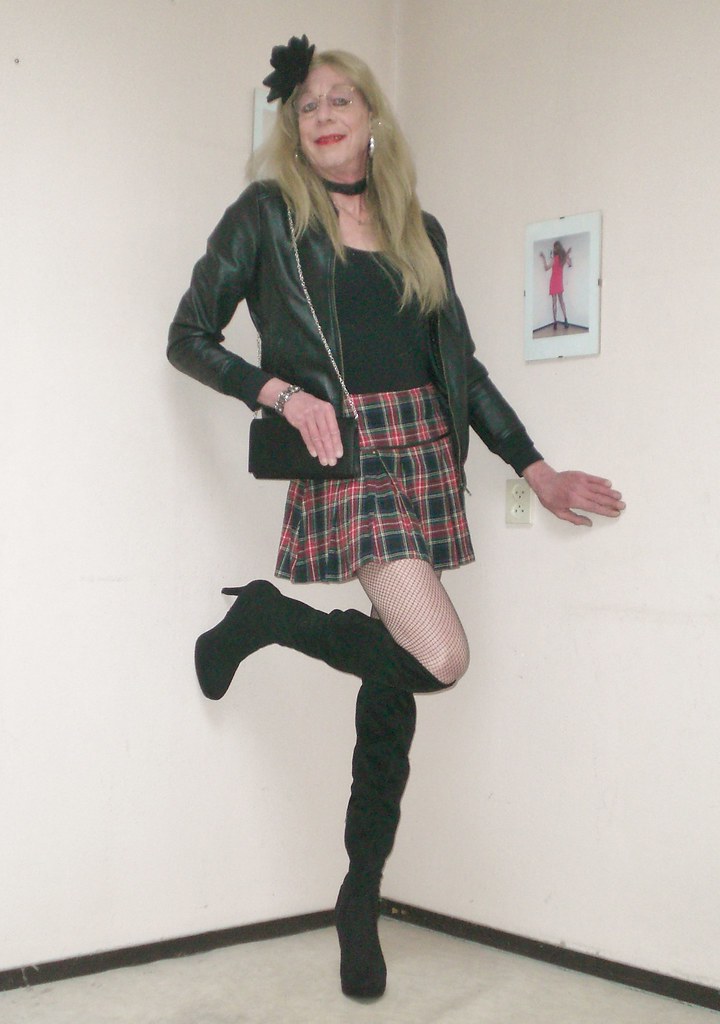 Short skirt and long boots.