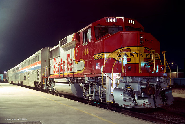 A Santa Fe GP60 and Amtrak cars on display at Phoenix Union Station.