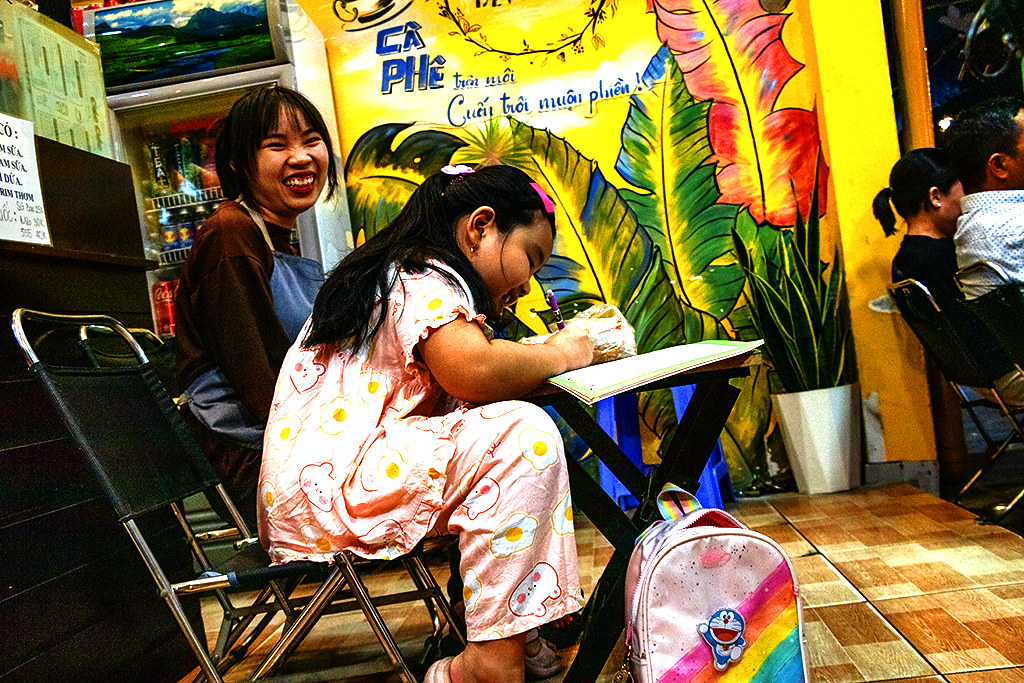 Girl practicing handwriting at Coc Coc Coffee on 3-18-24--Vung Tau copy