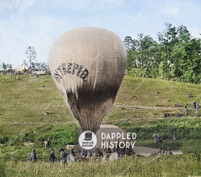 Intrepid being cross-inflated from Constitution, the smaller balloon, in a spur-of-the-moment attempt to get the larger balloon in the air to overlook the imminent Battle of Fair Oaks, May 1862, during the American Civl War. The balloon Intrepid, one of s
