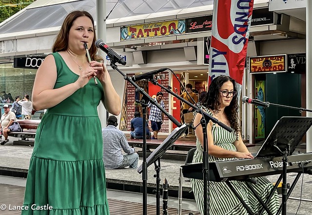 Music. The day before St Patrick’s Day 2024. Musicians on stage in Queen Street Mall Brisbane. Queensland.@wendylangmusic, Wendy Lang and @zannah, Zannah.