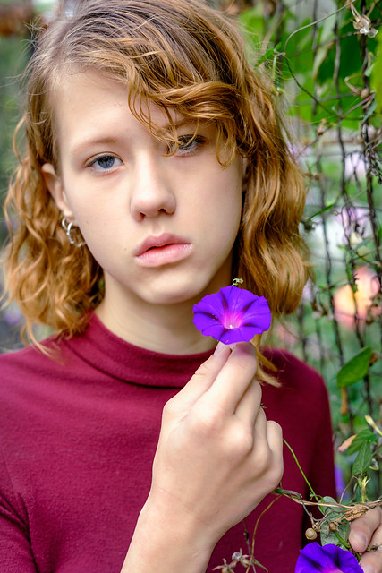 Innocent Bloom:Headshot Portrait with Purple Flower
