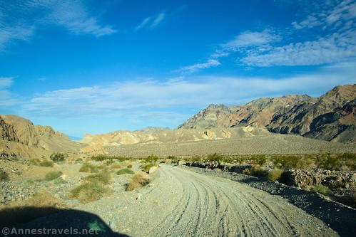 Looking down the road toward the badlands to the west along the Hole in the Wall Road, Death Valley National Park, California 