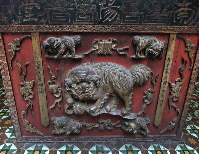 elaborate carving on a chest in a temple in Georgetown on the island of Penang, Malaysia