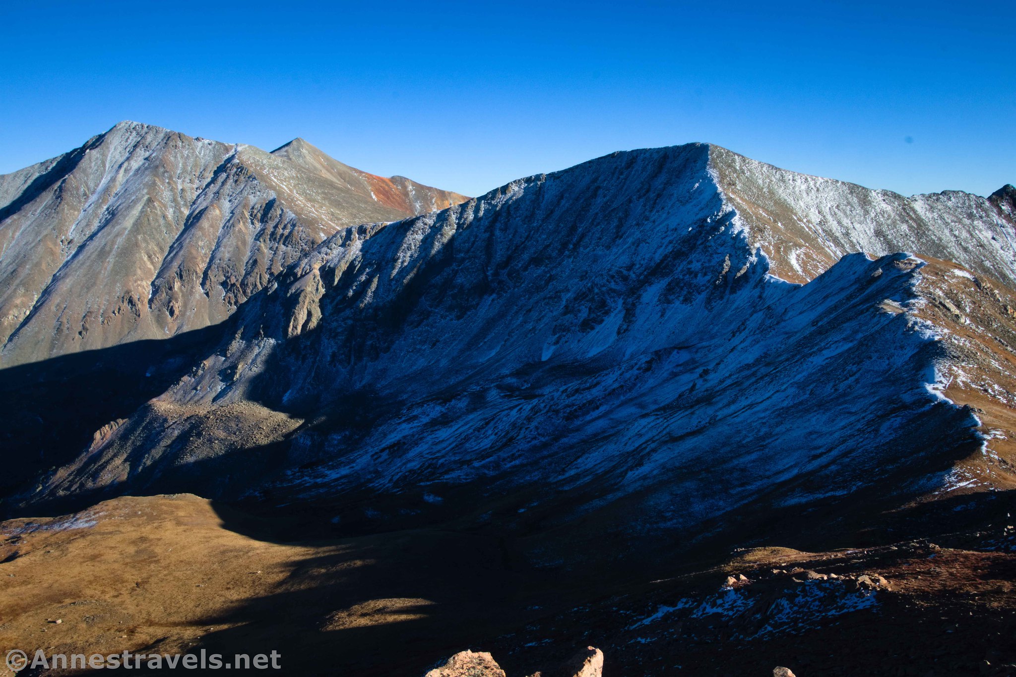 Torreys Peak, Grays Peak, and Grizzly Peak from Cupid Peak on a late autumn afternoon, Arapaho National Forest, Colorado