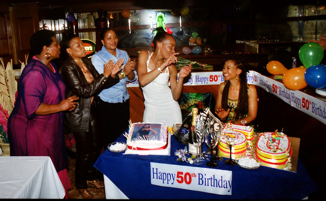 Julia Mathunjwa RIP 50th Birthday Celebration at Kopanang South African Social Club London 9th/10th July 2000 369w Julia of Shikisha in Green and Gold Embroidered Evening Dress with Sonti Mndebele Pinise Saul RIP and Thoko in White Evening Dress Singing H