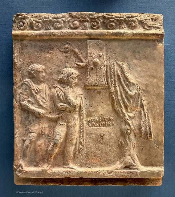 Terracotta relief depicting a Roman soldier guarding a captured Gaul