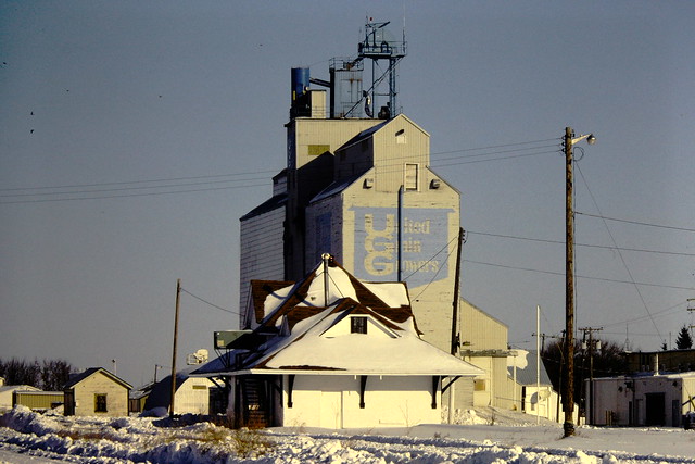 The old railway station and United Grain Growers grain elevator, Neepawa, Manitoba, Canada (1997)