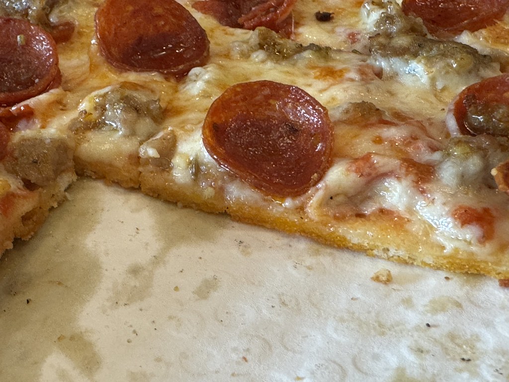Chicago tavern-style pepperoni and sausage pizza