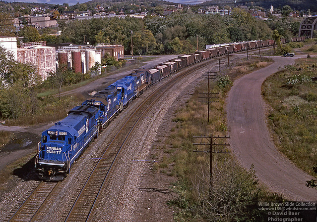Conway to Mingo local WICW-09 is being led by B23-7 1933 which is usually assigned to the geometry train along with GP38-2s 8235, 8253, & 8249 at Bridgewater, PA on 10/16/95.