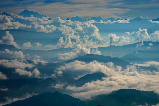Rolwaling Himalayan peaks, Nepal, tower above the sleepy foothills