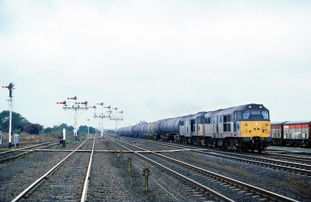 The old order on the Kingsbury Tanks is seen nearing journeys end.....6E54 31207 (D5631) + 319 (D5853) Kingsbury-Lindsey Barnetby 05-10-1991