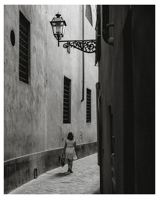 Passer by along a passage, Florence 2018