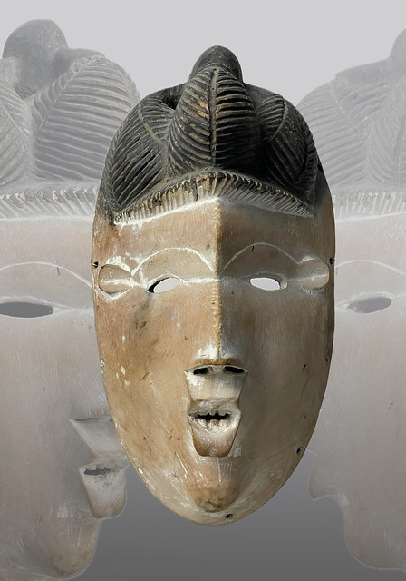 Cultura Igbo, maschera Okoroshi Oma - Igbo. Nigeria.   Legno, tracce di caolino, retro annerito. cm 22,9