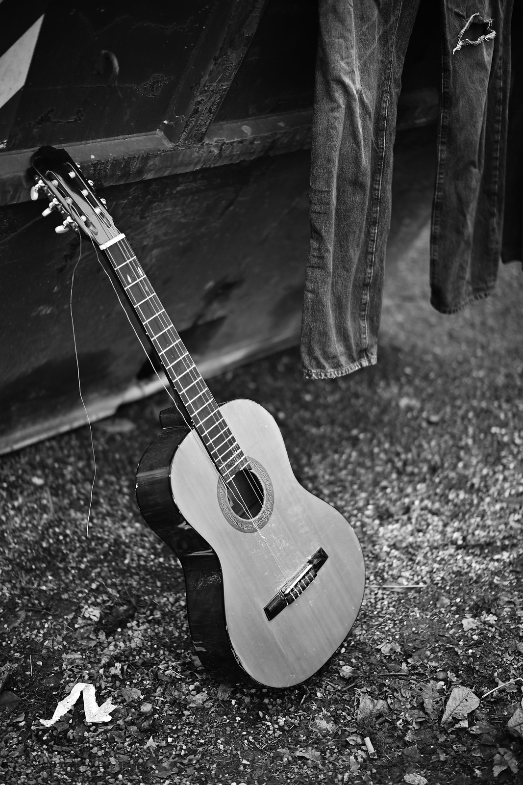 Broken guitar in black and white