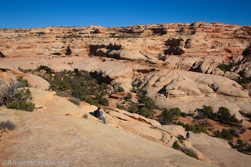 Heading down to the natural slide on the Fins Trail, Maze District of Canyonlands National Park, Utah