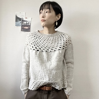 The Link Sweater by Tomomi Yoshimoto combines crochet and knitting.