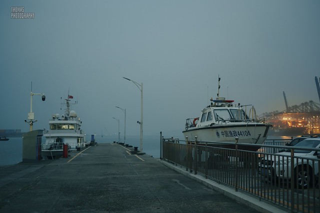 The pier in the evening in thick fog