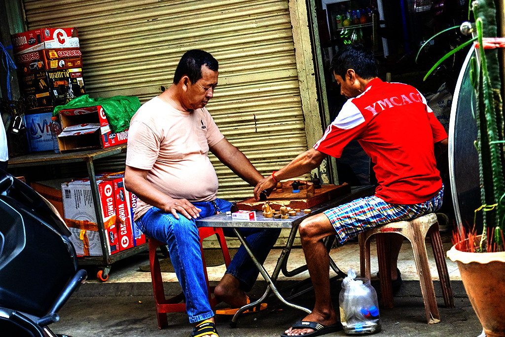 Two men playing chess on 3-29-24--Phnom Penh copy