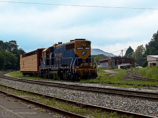 New England Central GP38AS 3855 with a wagon at White River Junction in Vermont USA