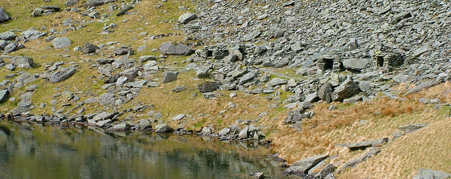 Stone shelters by the side of Small Water