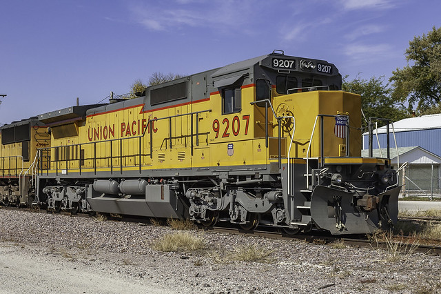 Recent repaint, UP 9207, GE C40-8 leads an eastbound MofW train at Missouri Valley IA 10-6-06 © Paul Rome